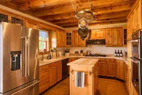 Mountain House + Guest Cottage on 65-acre property - Image 3