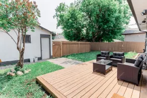 Cozy Spacious Family Home with a Fenced Yard - Image 5