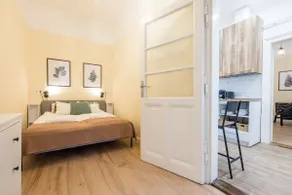 Compact two-bedroom retreat with AC & free parking - Image 2