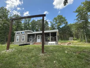 Tiny Home on 52 Acres, Private Pond 1/4 mile hike! - Image 3