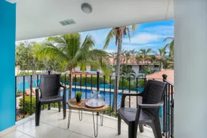 Sun-Kissed 2BR Oasis — A Pool & 5-Min to the Beach - Image 2