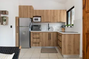 Sun-Kissed 2BR Oasis — A Pool & 5-Min to the Beach - Image 3