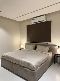 Room and lounge in Al Murooj B, self check-in and coffee corner - Image 2