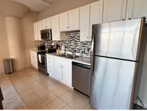 NEW! First Floor Downtown Condo! - Image 2