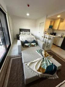 Modern apartment with pool near airport - Image 2