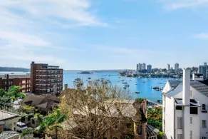 Art-Filled Apartment with Expansive Harbour Views - Image 3