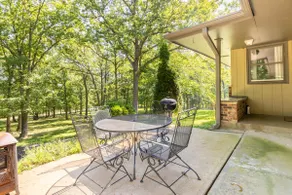 Home on the hill, nestled in the woods. - Image 5