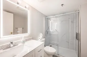 Hotel room with two beds at Domaine Saint-Sauveur - Image 4