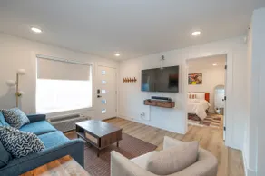 Luxury 1BR Condo: OPEN Pool + Prime Location - Image 3