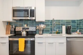 Luxury 1BR Condo: OPEN Pool + Prime Location - Image 2