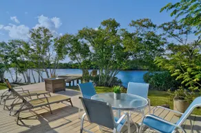 NO ADDED AirBnB FEES! Exotic Water Front Sleeps 14 - Image 2