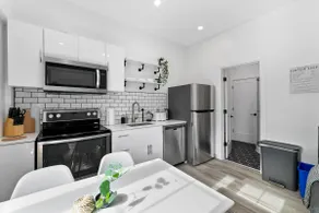 Modern 1BR Guesthouse | Near Marina & Golf - Image 3