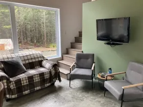 The chalet has a Smiley and Spa - Image 3