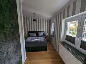 Maisonette apartment with a hot tub - Image 2