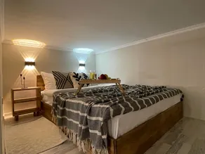 Loft-style studio on two levels in the city center - Image 2