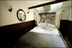 Raven Haven: Cozy Forest Storybook Cabin w Hot Tub - Image 3