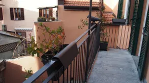 A balcony overlooking the lake - Image 3