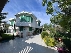 Villa with Green Shutters and Garden - Image 4