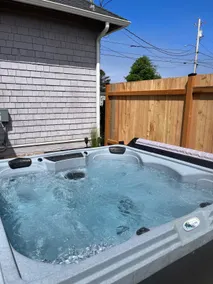Cozy Hot Tub, and walkability to town and beach. - Image 2