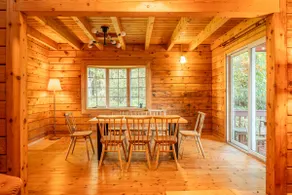 Natural log house nestled in the serene mountains - Image 3