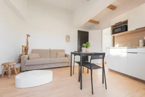 Nice air-conditioned 2-room apartment with garden and private parking - Image 5
