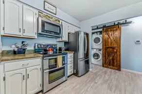 Large Upgraded, Family Friendly Condo with Garage - Image 3