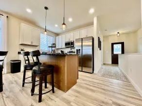 Beautiful NEW Ranch Home with a large deck and games - Image 5