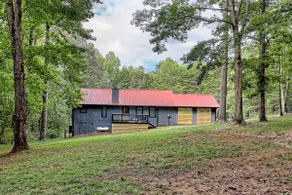 Cozy 3BR Getaway | Lake access, Fire Pit, Trails - Image 3