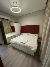 Modern 1BR | Janabiyah Bahrain | Gym Access - Image 2