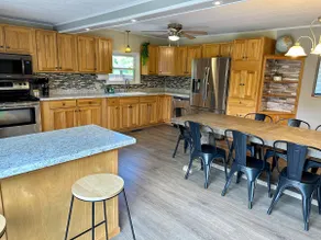 HotTub, Fire Pit, Tree House Deck, Stocked Kitchen - Image 5