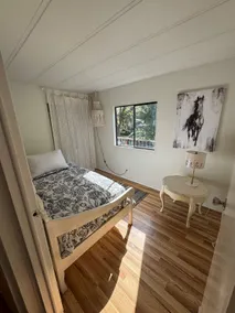 Rustic cozy cabin on rivers edge - Image 2