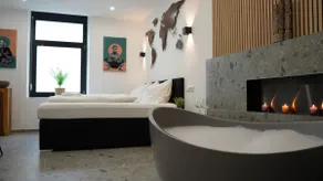 Suite with tub and fireplace - Image 2