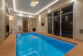 Mocha House with Indoor Pool, BBQ & Bonfire at Lonavala by StayVista - Image 3