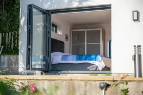 Sunny retreat by the water - Image 5