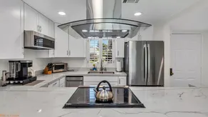 Fully Stocked Condo • Kind bed + Private Patio! - Image 2