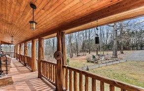 Spacious log house retreat w/ hot tub & pool table - Image 3