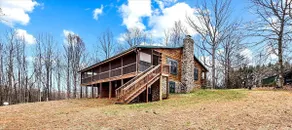 Spacious log house retreat w/ hot tub & pool table - Image 2