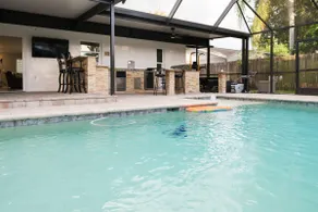 Lush Vacation Home with Pool - Image 3