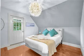 2BR Downtown Retreat: Mins to Beach, BBQ & Firepit - Image 4