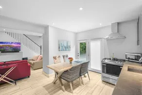 2BR Downtown Retreat: Mins to Beach, BBQ & Firepit - Image 2