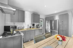 2BR Downtown Retreat: Mins to Beach, BBQ & Firepit - Image 3