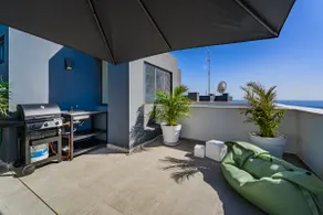 Cozy 2-BR Penthouse with Private Rooftop Terrace - Image 3