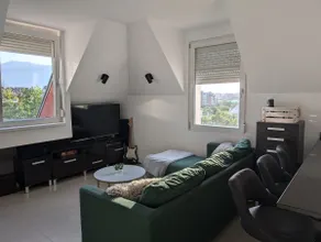 Cozy attic with city view - Image 2