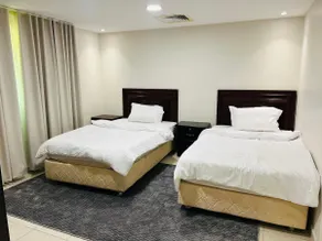 AL HUWAILAT DELUXE APPARTMENT - Image 5