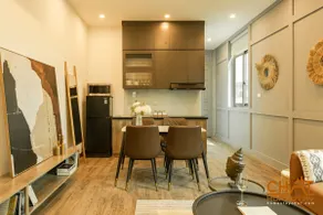 2BR Serenade | Kitchen & Laundry • 5 Min to Center - Image 4