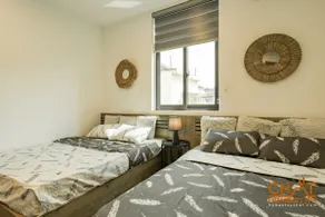 2BR Serenade | Kitchen & Laundry • 5 Min to Center - Image 5