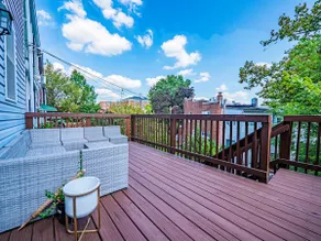 Homie 2BR w/ 1.5BA Home with Patio & Deck in NW DC - Image 3