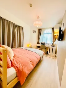 This new tenement house is located in a quiet residential area. The location is a 4-minute walk from Koenji Station. - Image 2