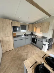 Lyons Winkups Holiday Park Towyn Rhyl 3 Bedroom sleeps Disabled access ramp onto decking area free entertainment Pet friendly beds made up on arrival NEW to the market - Image 4