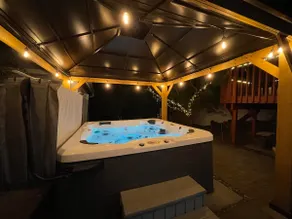 HOT TUB at a cozy private suite with a large patio - Image 2